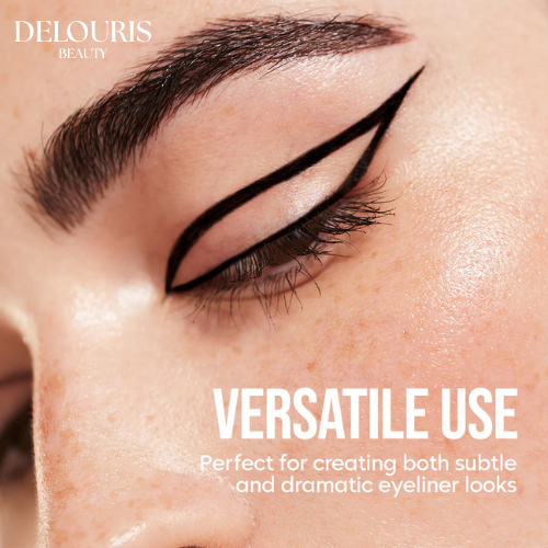 Close-up of an eye with black eyeliner, featuring Delouris Beauty branding.